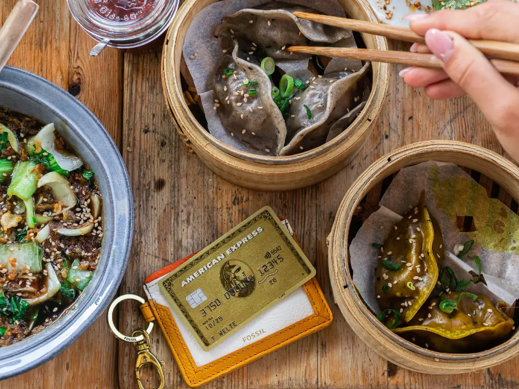 Amex card on table with Asian dumplings